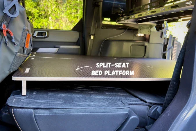 SWW split-seat bed platform for Ineos Grenadier — overlanding sleep setup