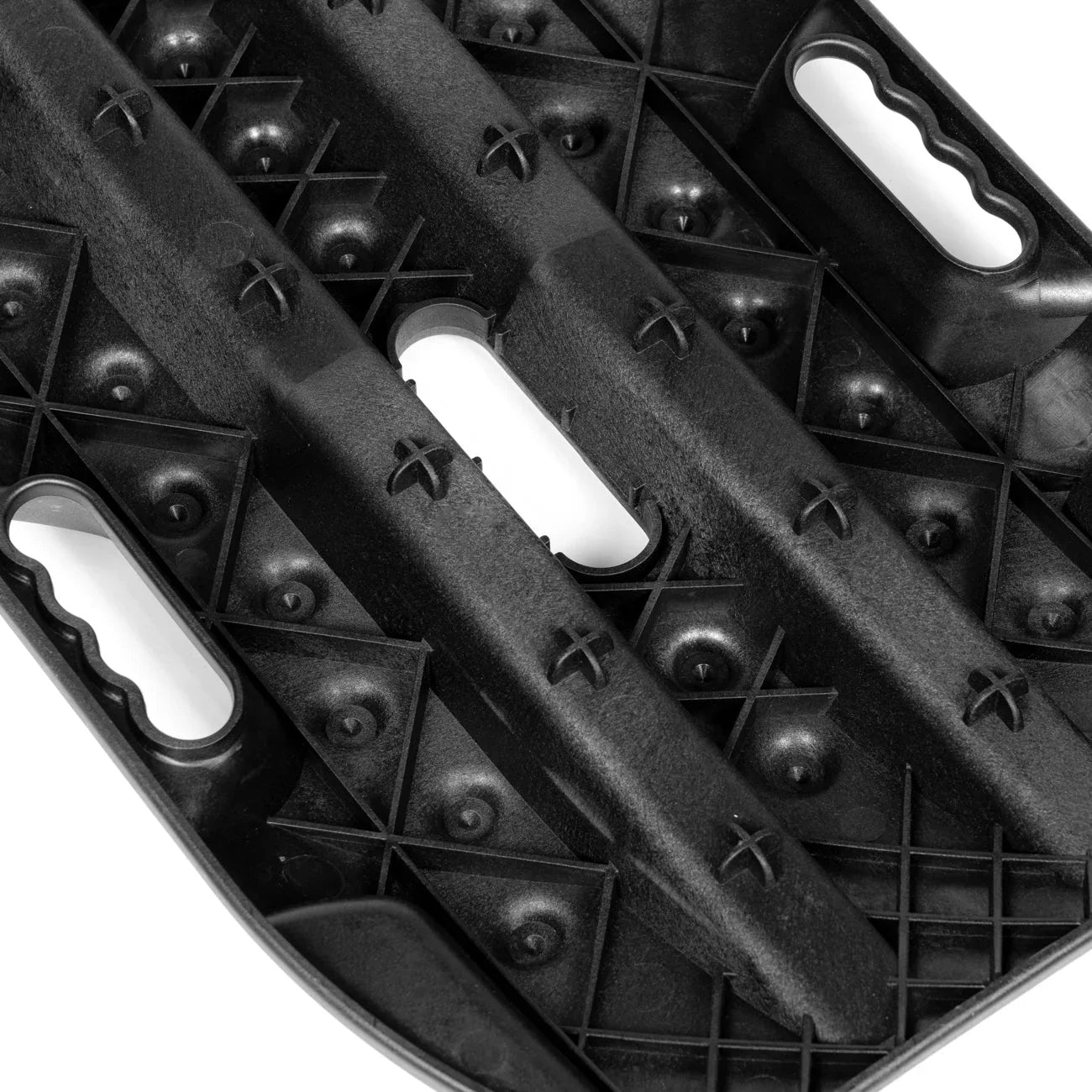 Close-up of black plastic recovery board with textured surface and built-in handles