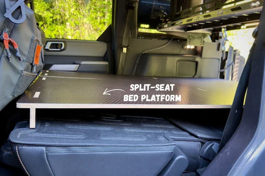 SWW split-seat bed platform for Ineos Grenadier — overlanding sleep setup
