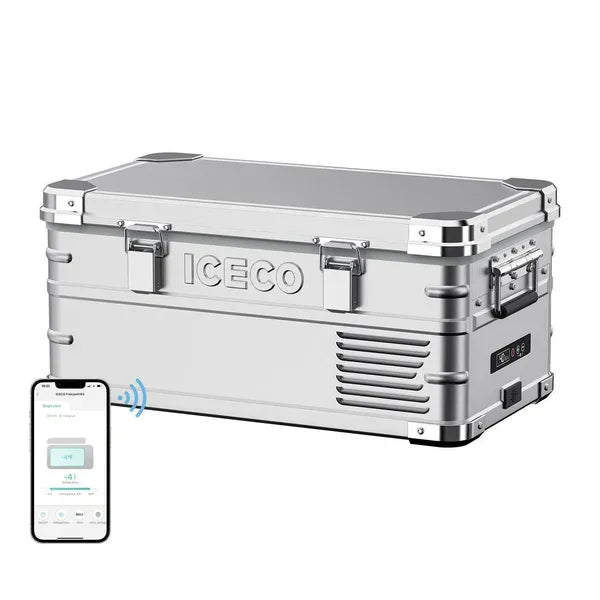 Silver portable vehicle fridge freezer with smart control app on smartphone, metal latches, and side handles.