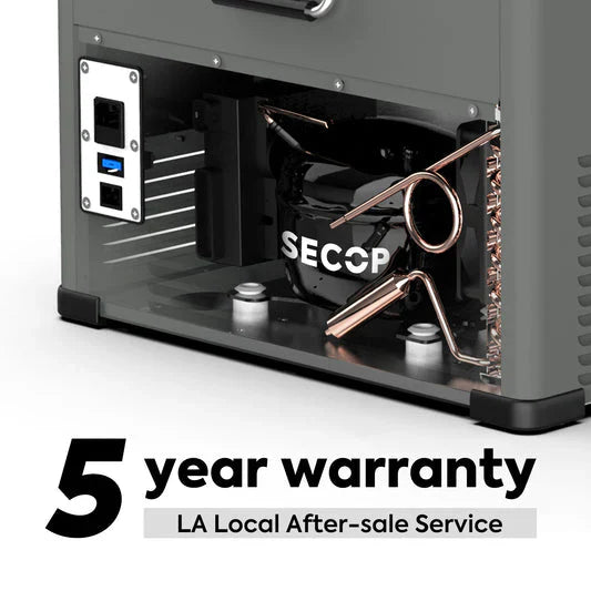 Close-up of a vehicle storage drawer compressor unit with five year warranty text