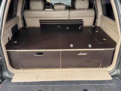 Custom wood vehicle drawer system for SUV cargo storage, two drawers, black textured finish