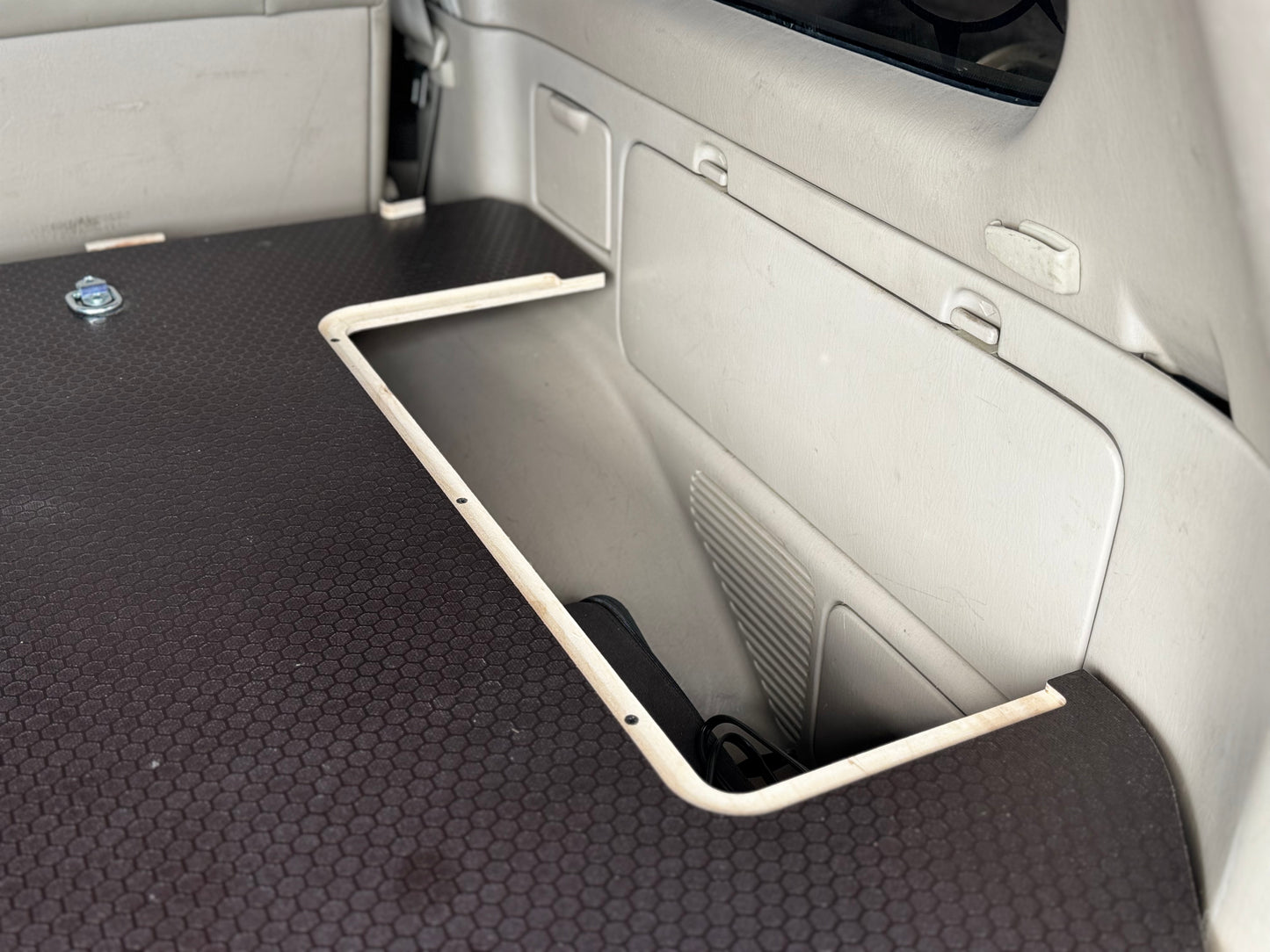 Custom vehicle storage drawer system with hex pattern platform and cutout compartment