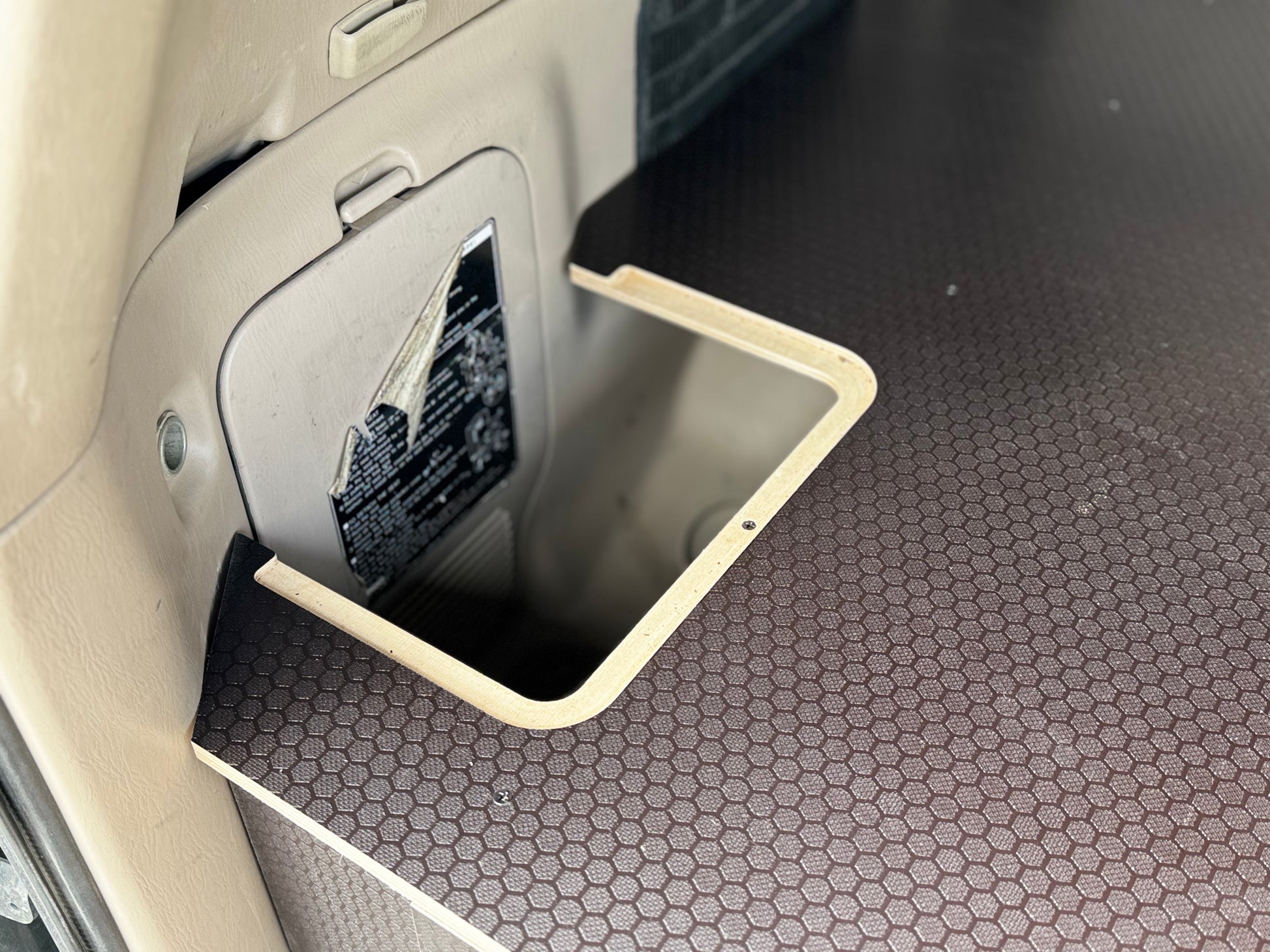 Custom vehicle drawer system with hex patterned surface and open storage compartment