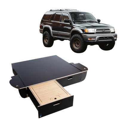 SUV with modular vehicle drawer storage system and pull-out wooden drawer organizer.