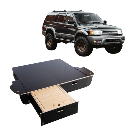 SUV with modular vehicle drawer storage system and pull-out wooden drawer organizer.