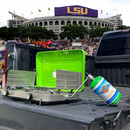Portable camping stove with green fuel canister in a truck bed at LSU Tiger Stadium